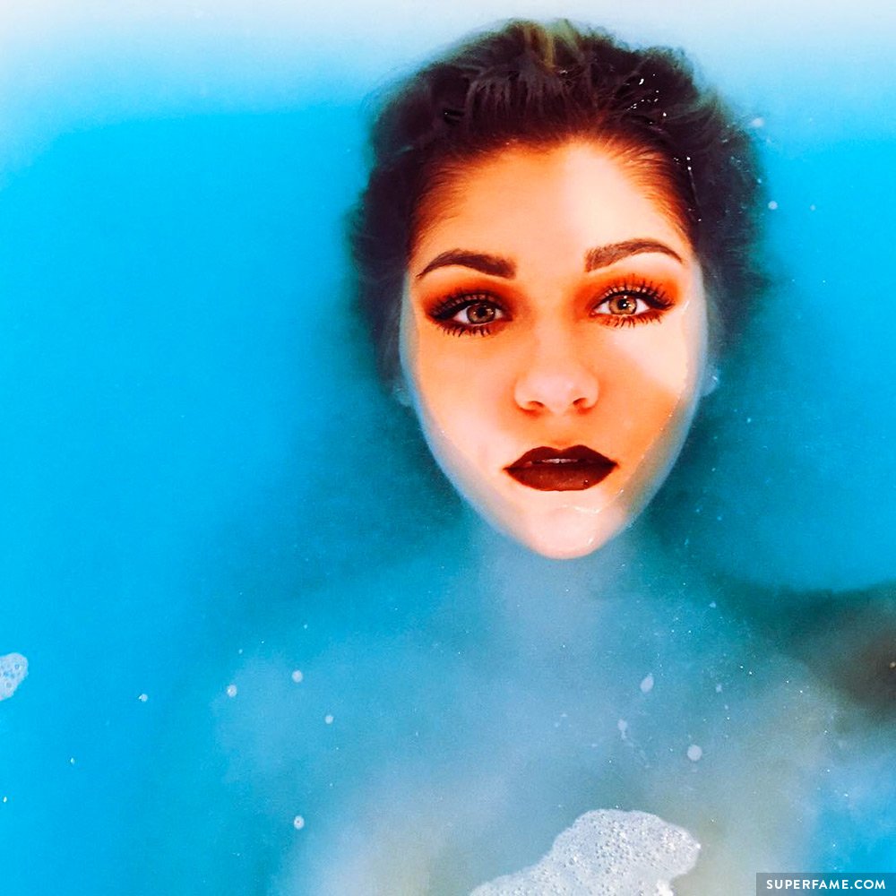 Andrea Russett takes a pretty photo in the water. (Photo: Instagram)