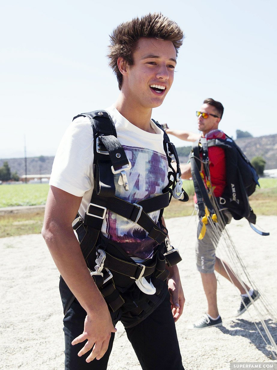 Happy Cameron Dallas in harness.