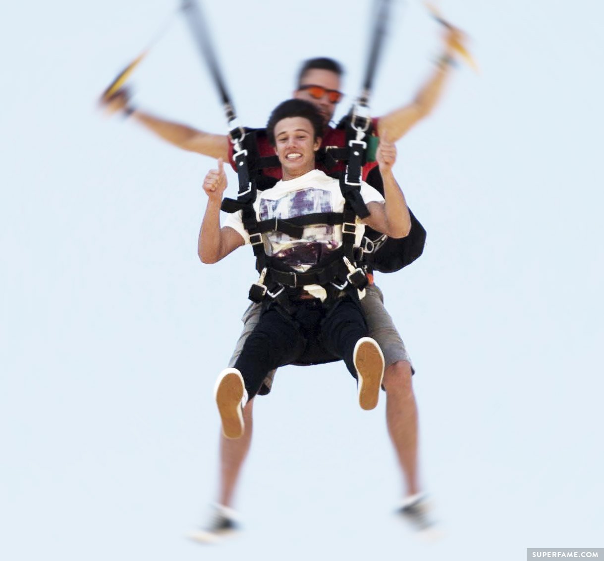 Cameron Dallas parachuting.