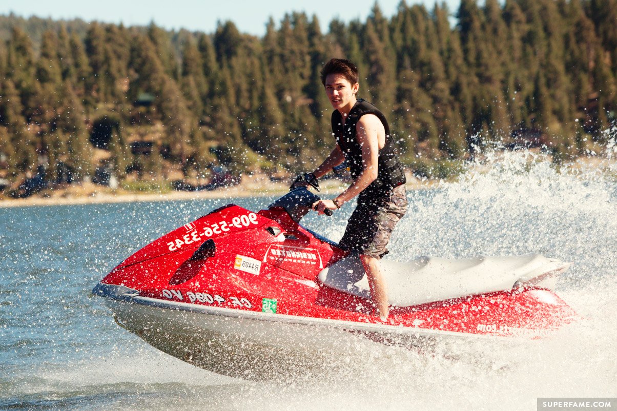 Carter Reynolds rides a red jetski.