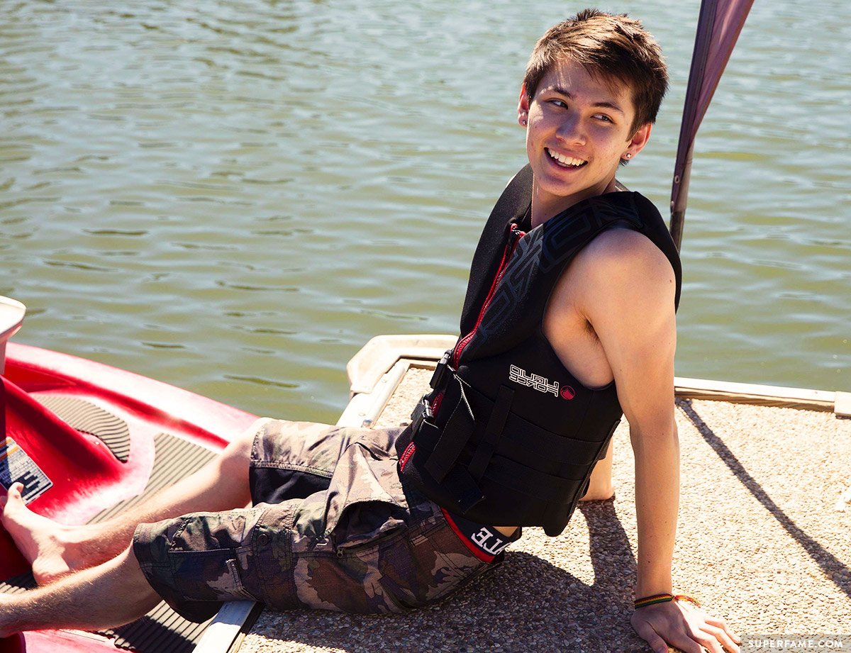 Carter Reynolds smiles at the dock before filming.