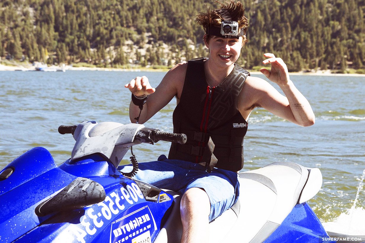 Nash Grier smiles on a jetski.