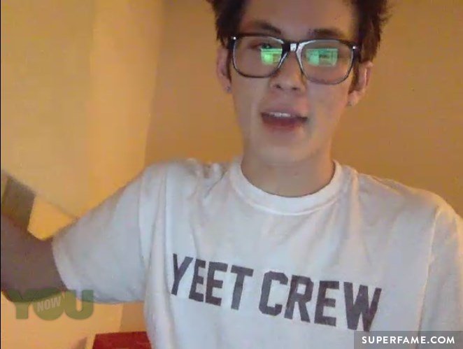 Carter Reynolds in glasses.