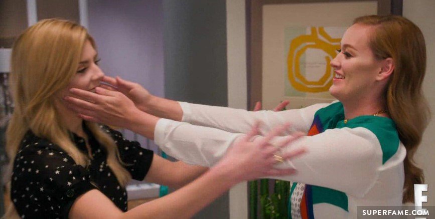 Mamrie Hart and Grace Helbig hugging.