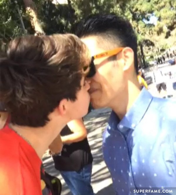 Nash Grier kisses a male guy fan.