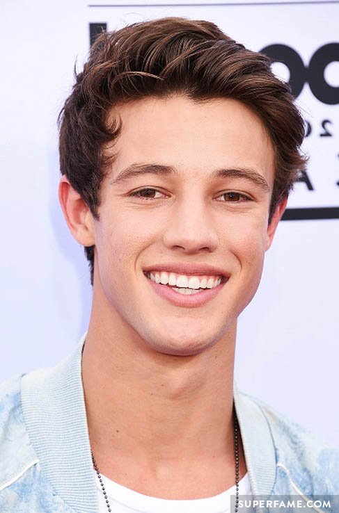 Cameron Dallas smiles.