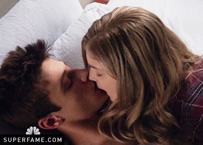 Elena and Cameron kissing.