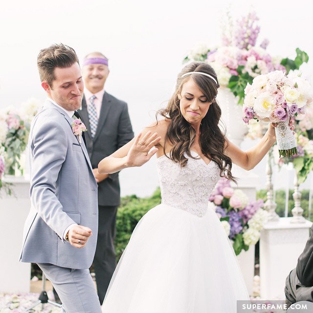 Colleen Ballinger and Josh bodyroll down the aisle.