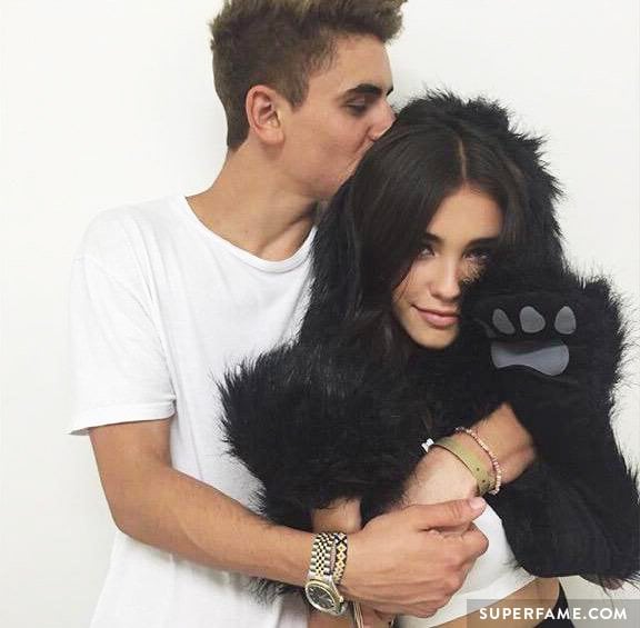 Jack Gilinsky kisses Madison Beer.