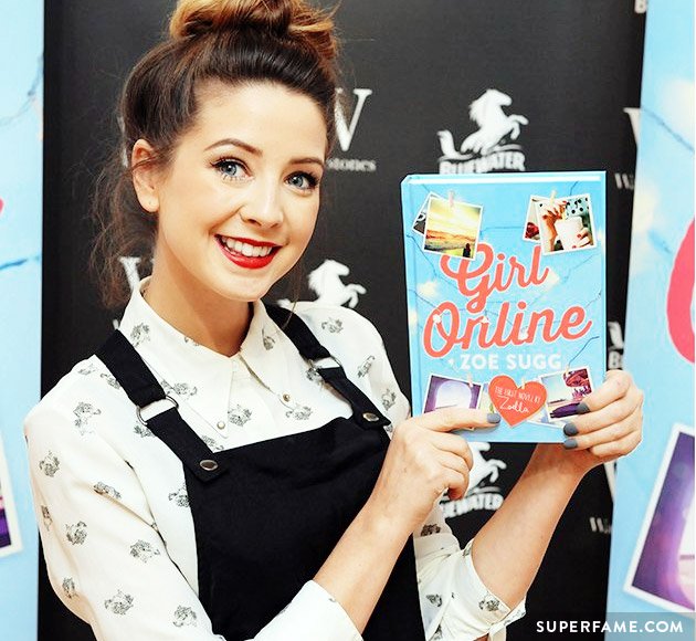 Zoella with a copy of Girl Online.