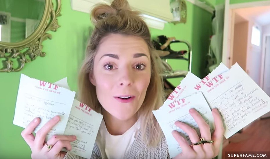 Grace Helbig with letters.