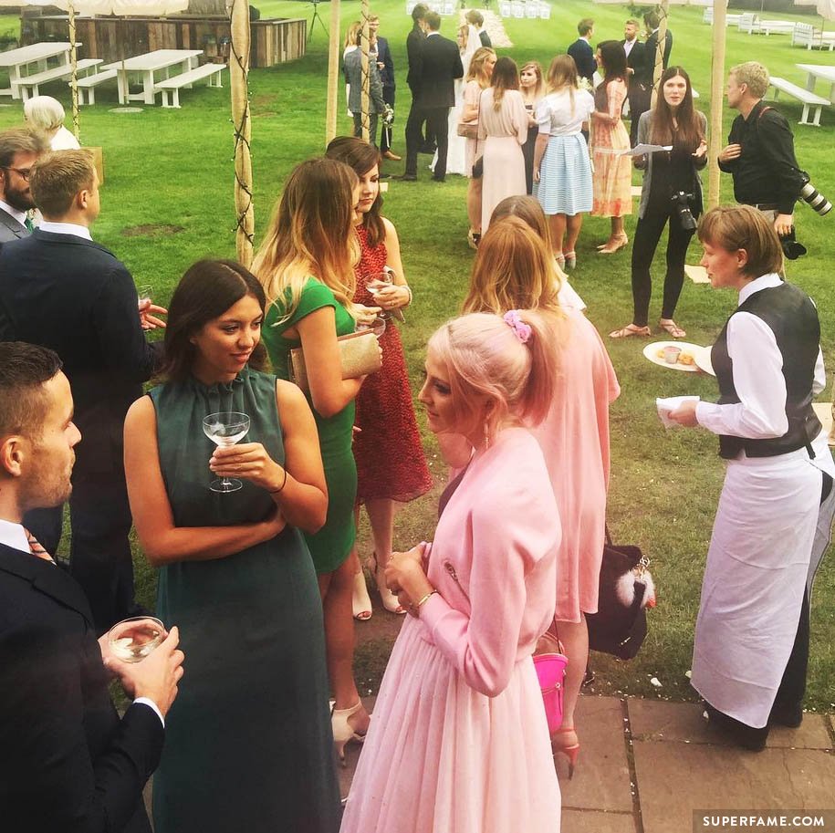 Wedding guests talking.