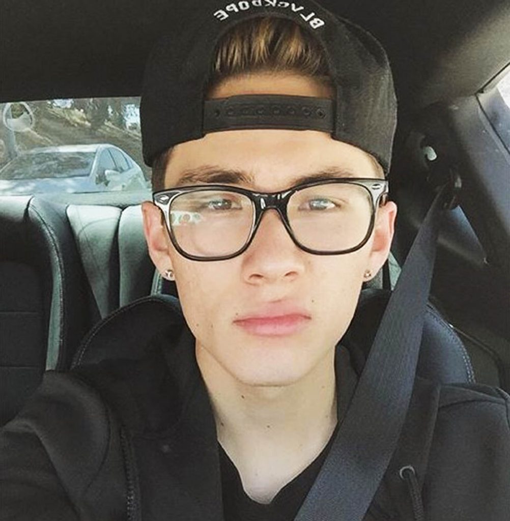 Carter Reynolds wearing glasses.