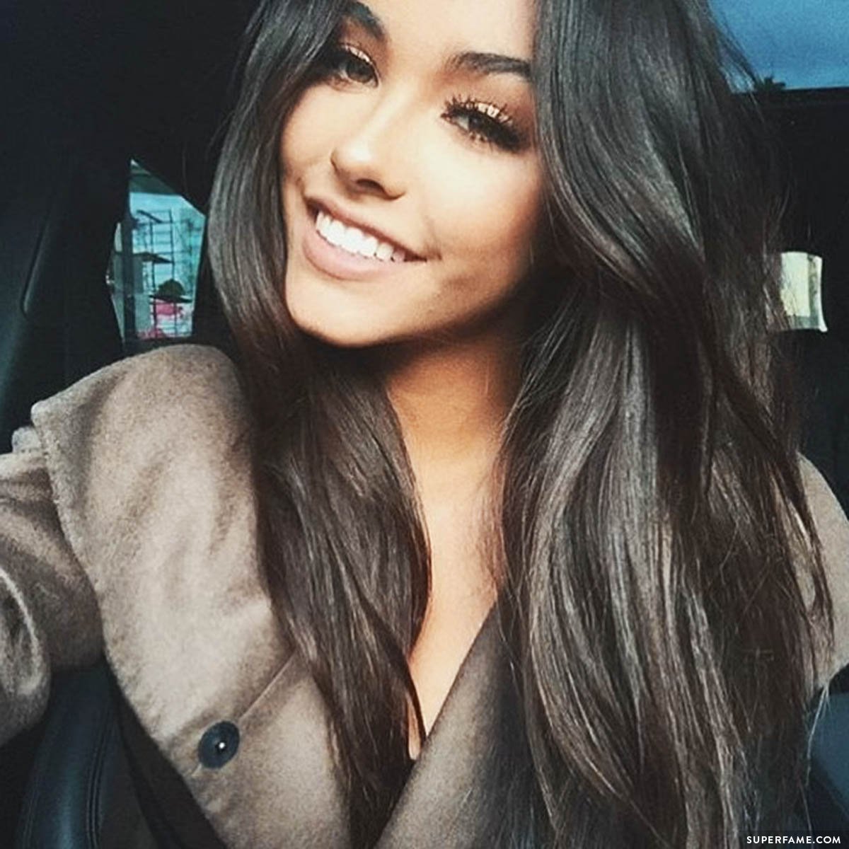 Madison Beer smiling.