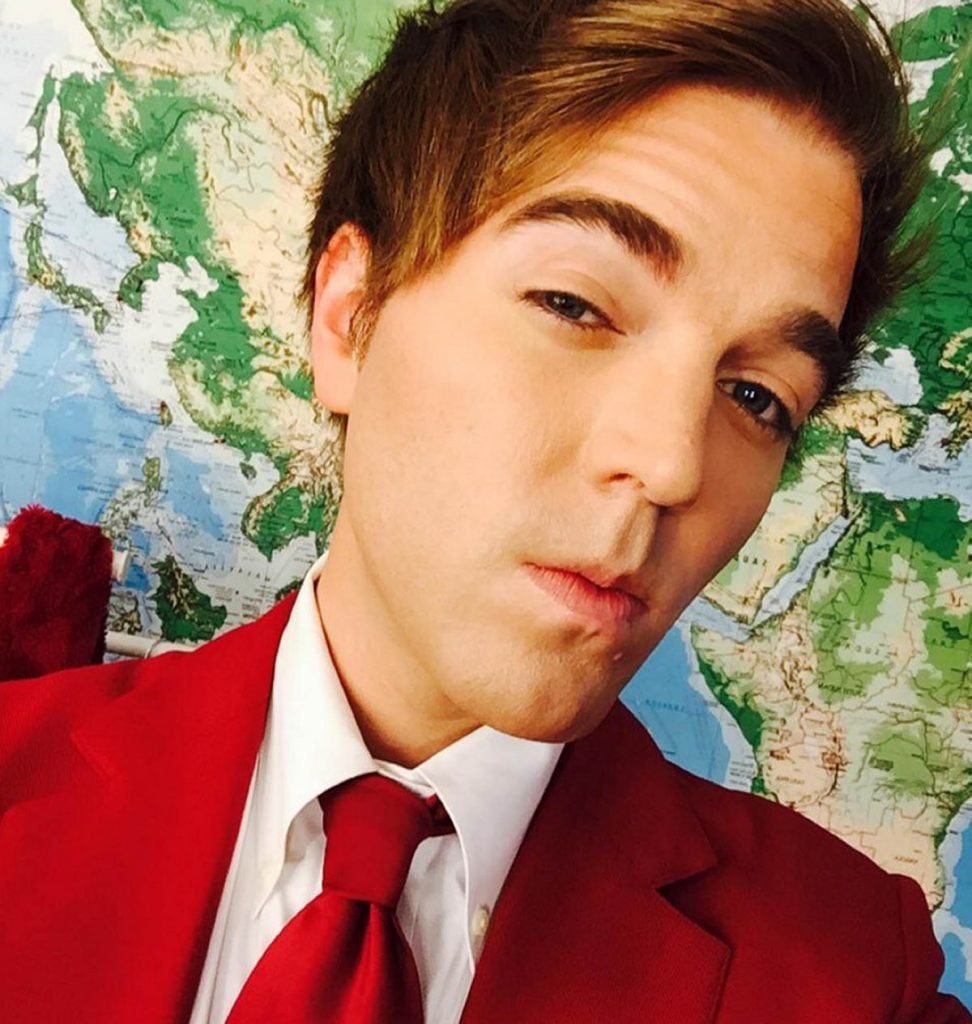 Shane Dawson in a red suit.