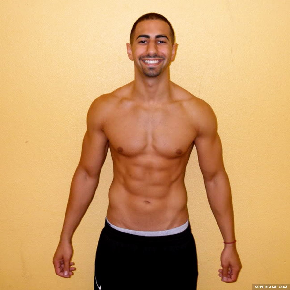 Yousef Erakat's shirtless body.