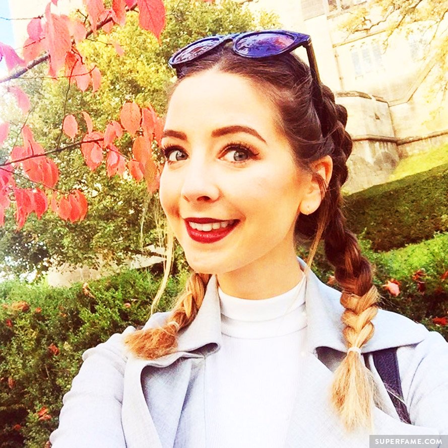 Zoella in braids.