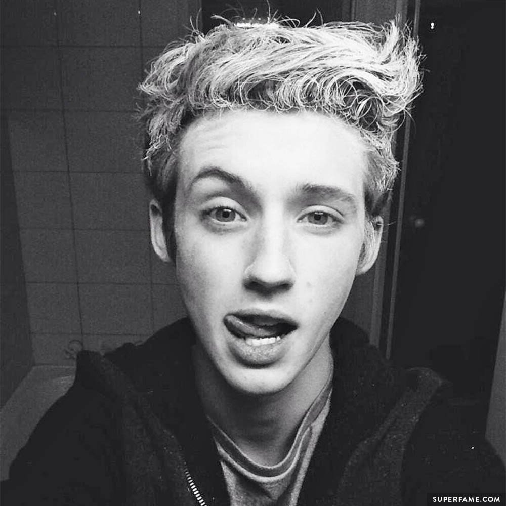 Troye Sivan in blonde hair.