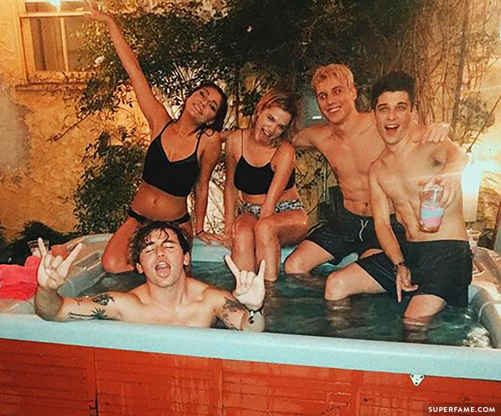 Andrea Russett in hot tub.