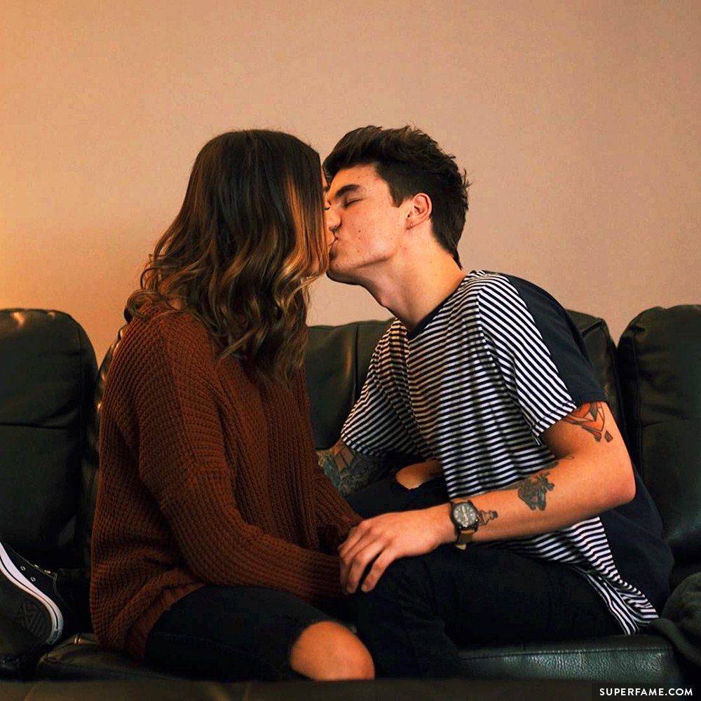 Kian Lawley and Andrea Russett kiss.