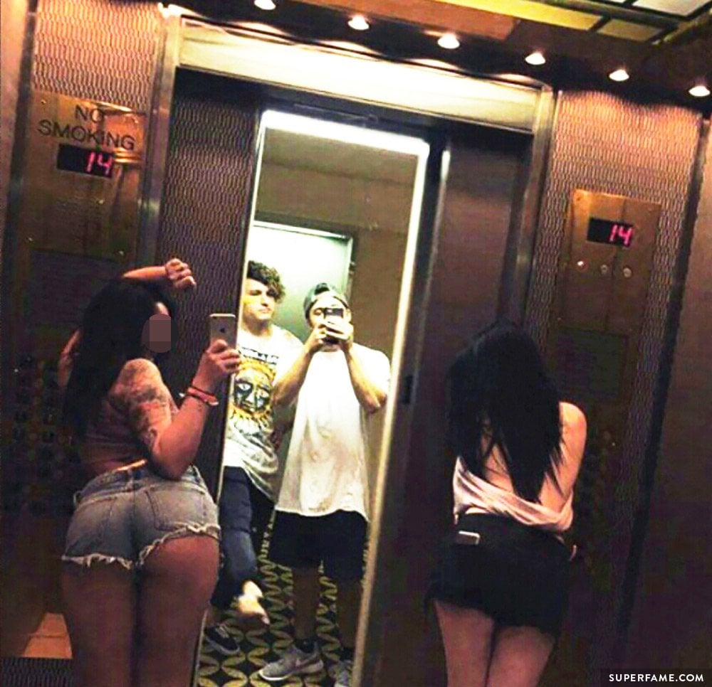 JC, Dom in elevator.