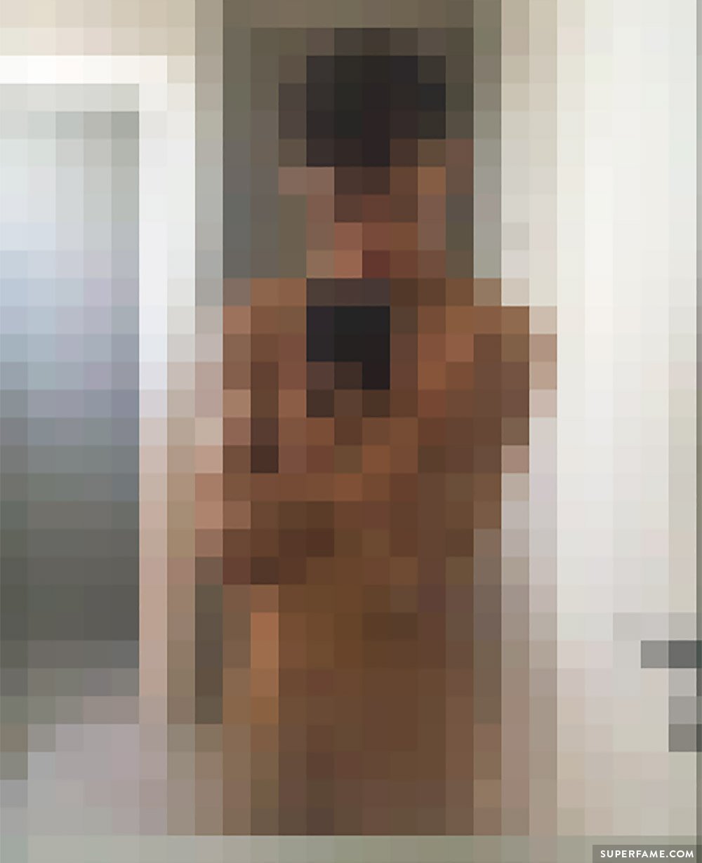 Troye Sivan in a bathroom, nude.