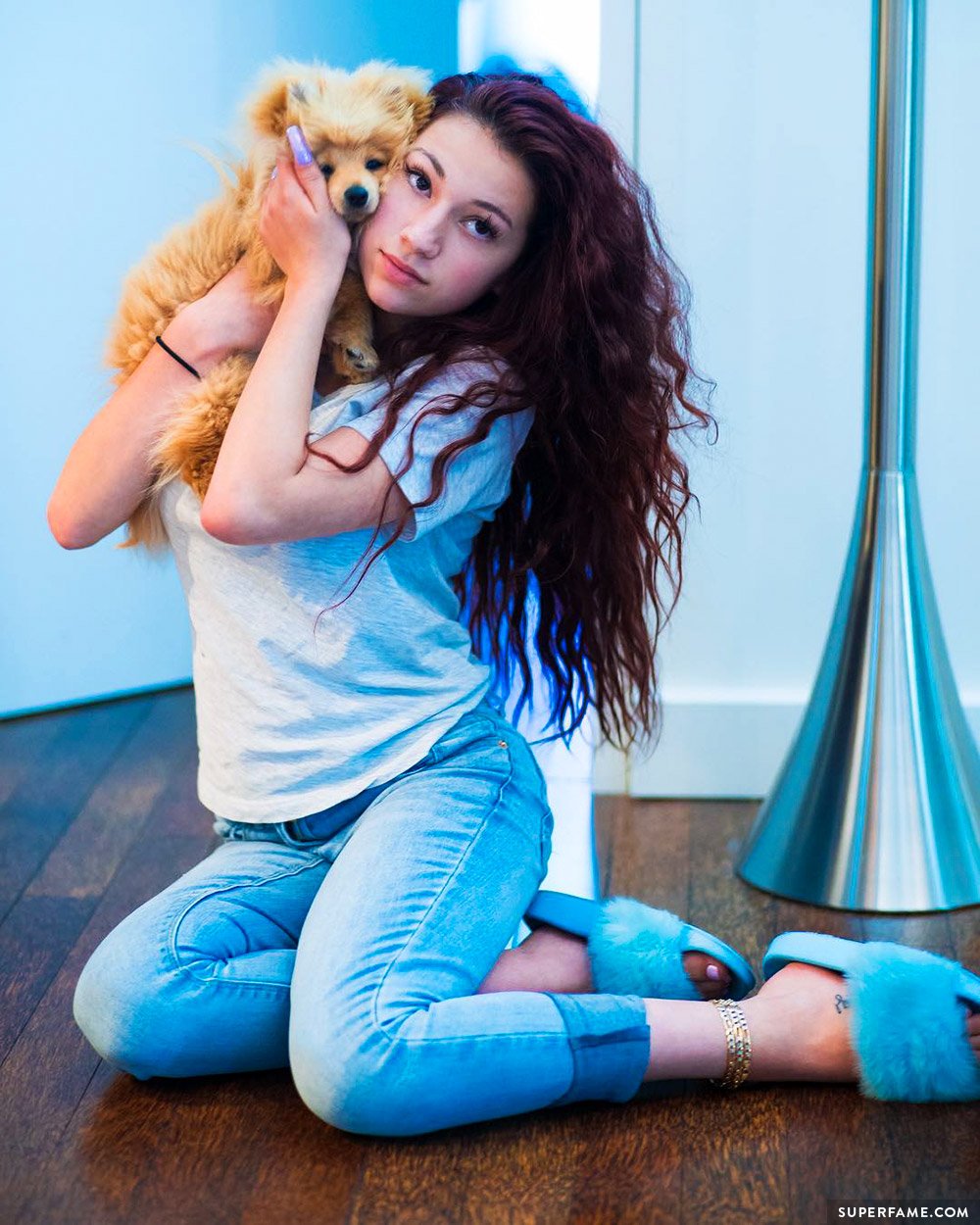 Bhad Bhabie with a puppy.